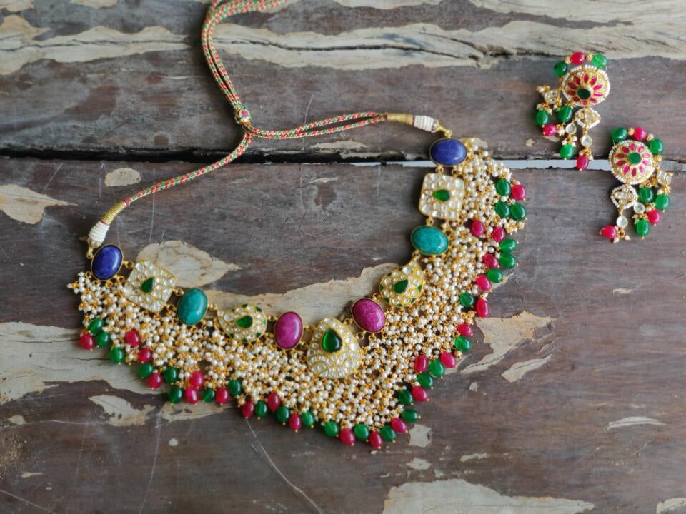 Uniquely Designed Necklace Studded With Red And Green Stones