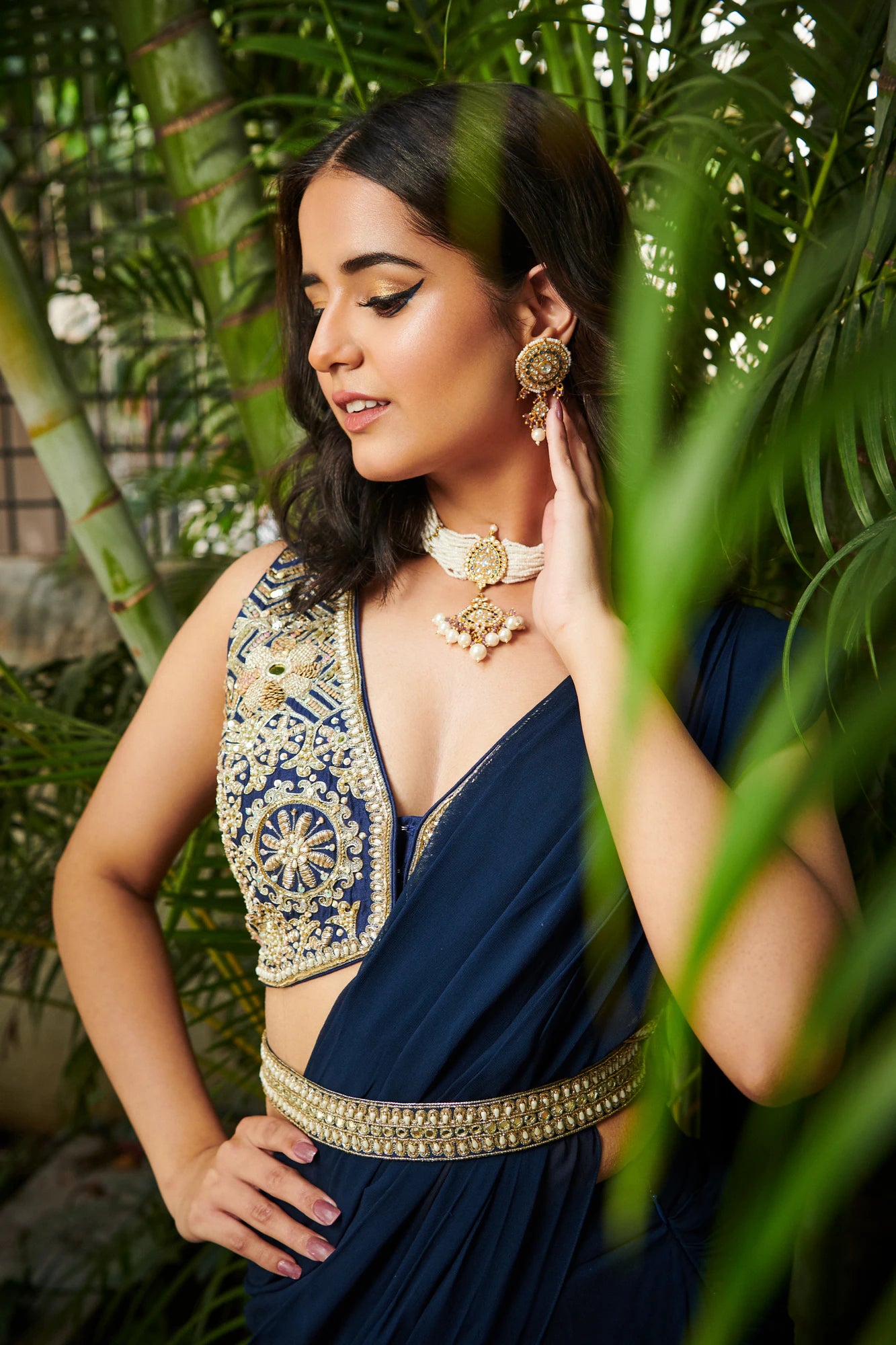 White Jadtar Choker Set With White Pearl And Blue Hangings