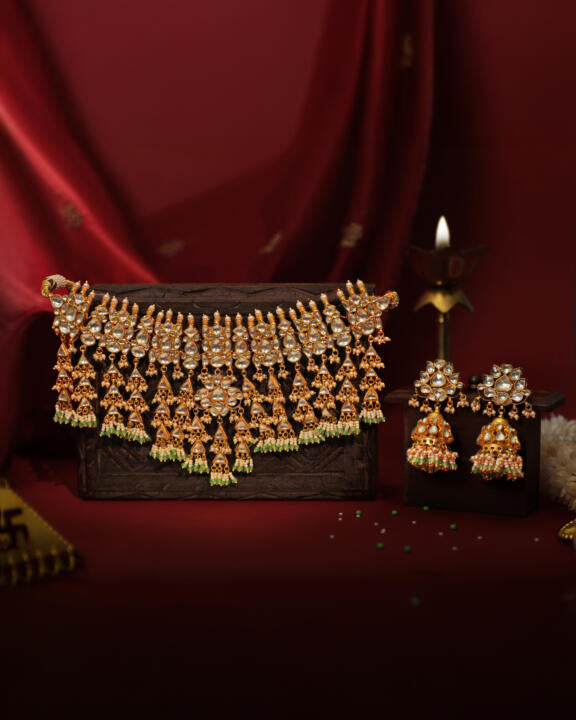 Heavy jadtar kundan set with pearl and jhumkis
