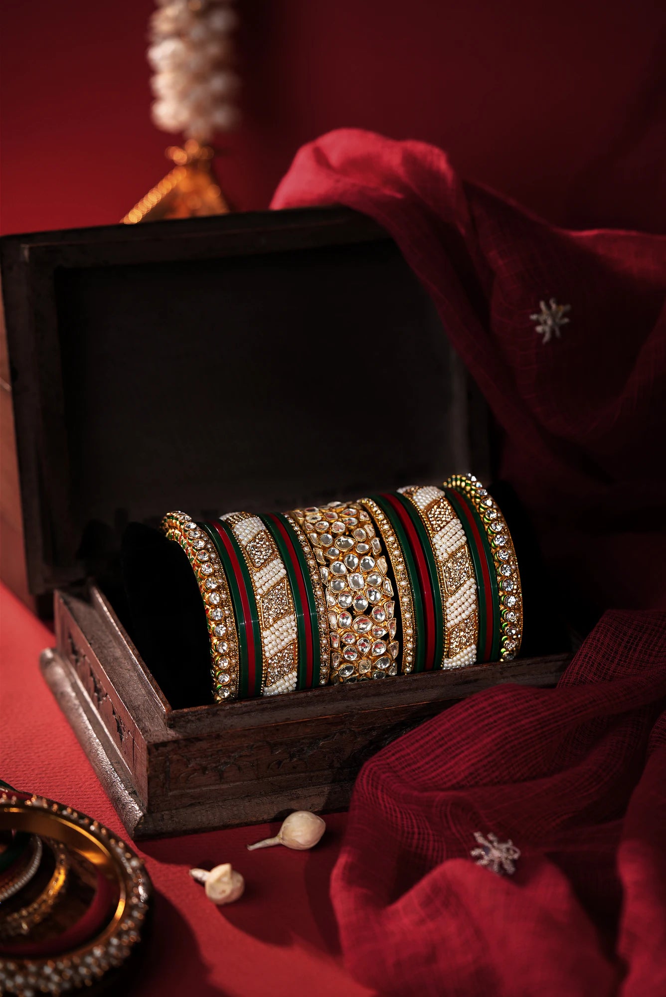Punjabi chuda cum bridal bangles set in emerald green and red bangles