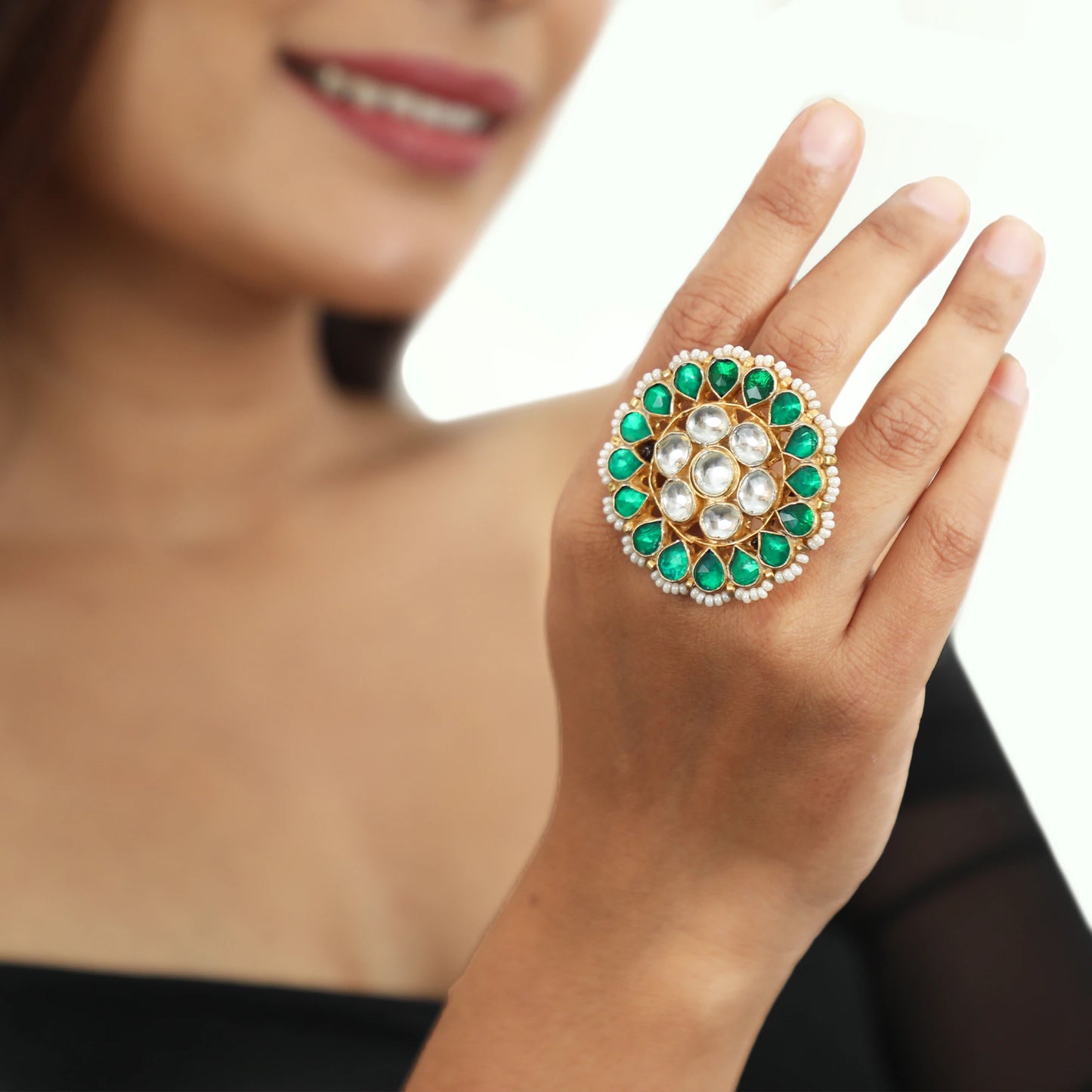 Traditional Ring In Floral Design With Green And White Studded Jadtar Stones