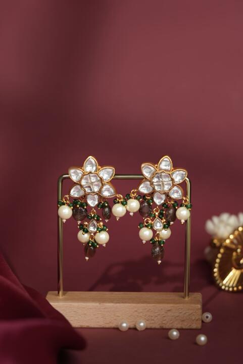 Handcrafted earrings with shell pearls and green beads