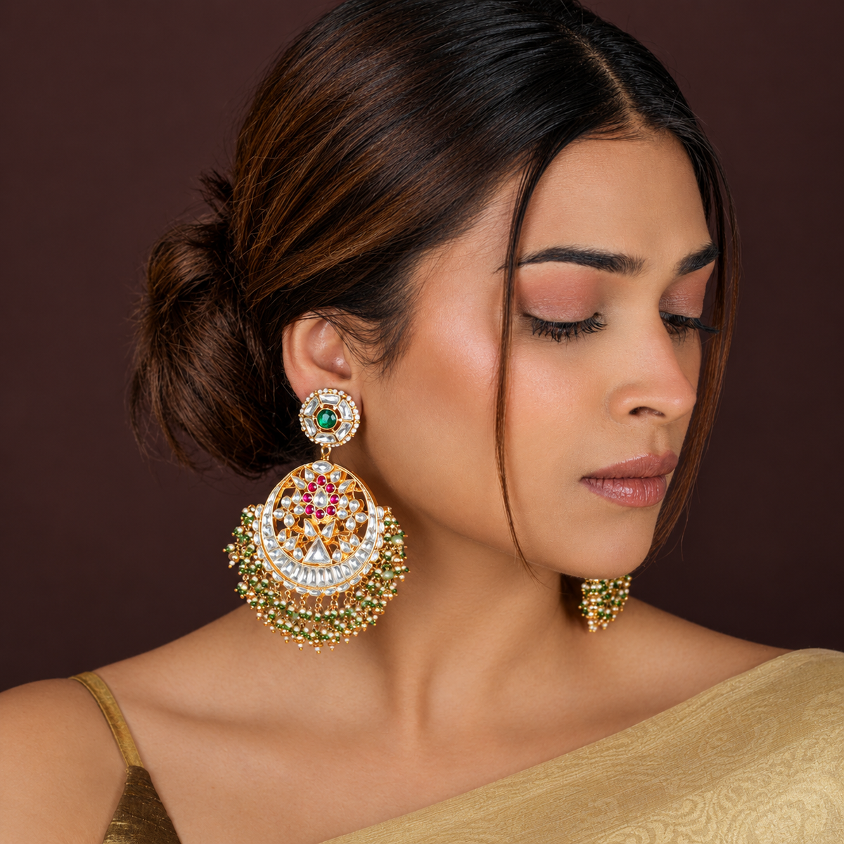 Royal gold-plated kundan chandbali earrings adorned with pearls and beads