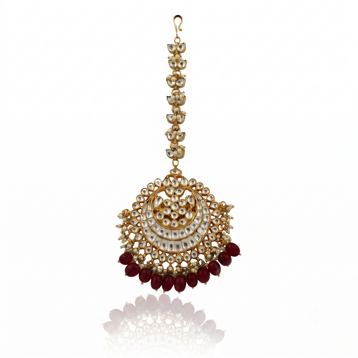Heavy  Maangtikka Studded With Jadtar Stones And Green Drops