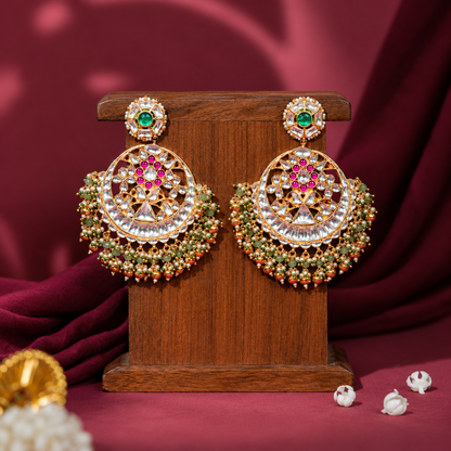 Royal gold-plated kundan chandbali earrings adorned with pearls and beads