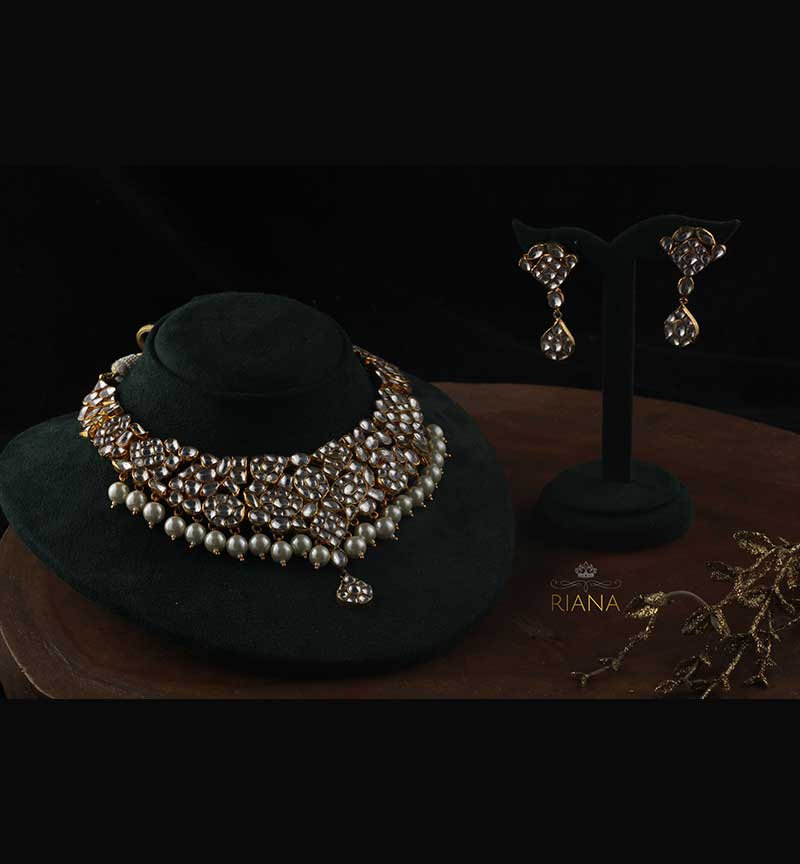 White Pearls and jadtar stdded necklaces