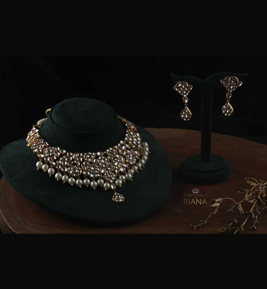 White Pearls and jadtar stdded necklaces