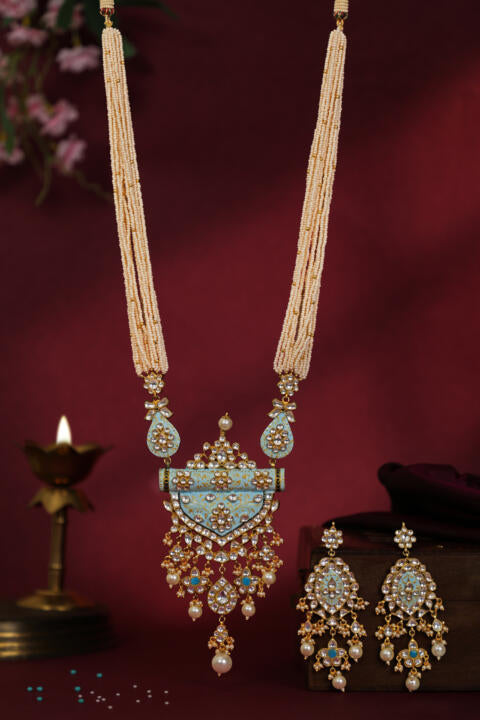 Firozi blue pendant necklace with delicate mina work and long festive wear earings