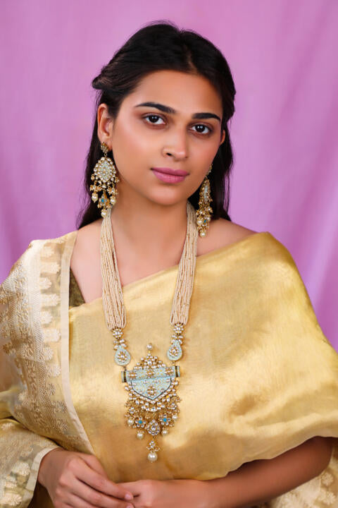 Firozi blue pendant necklace with delicate mina work and long festive wear earings