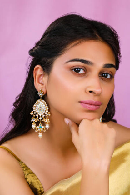 Firozi blue pendant necklace with delicate mina work and long festive wear earings