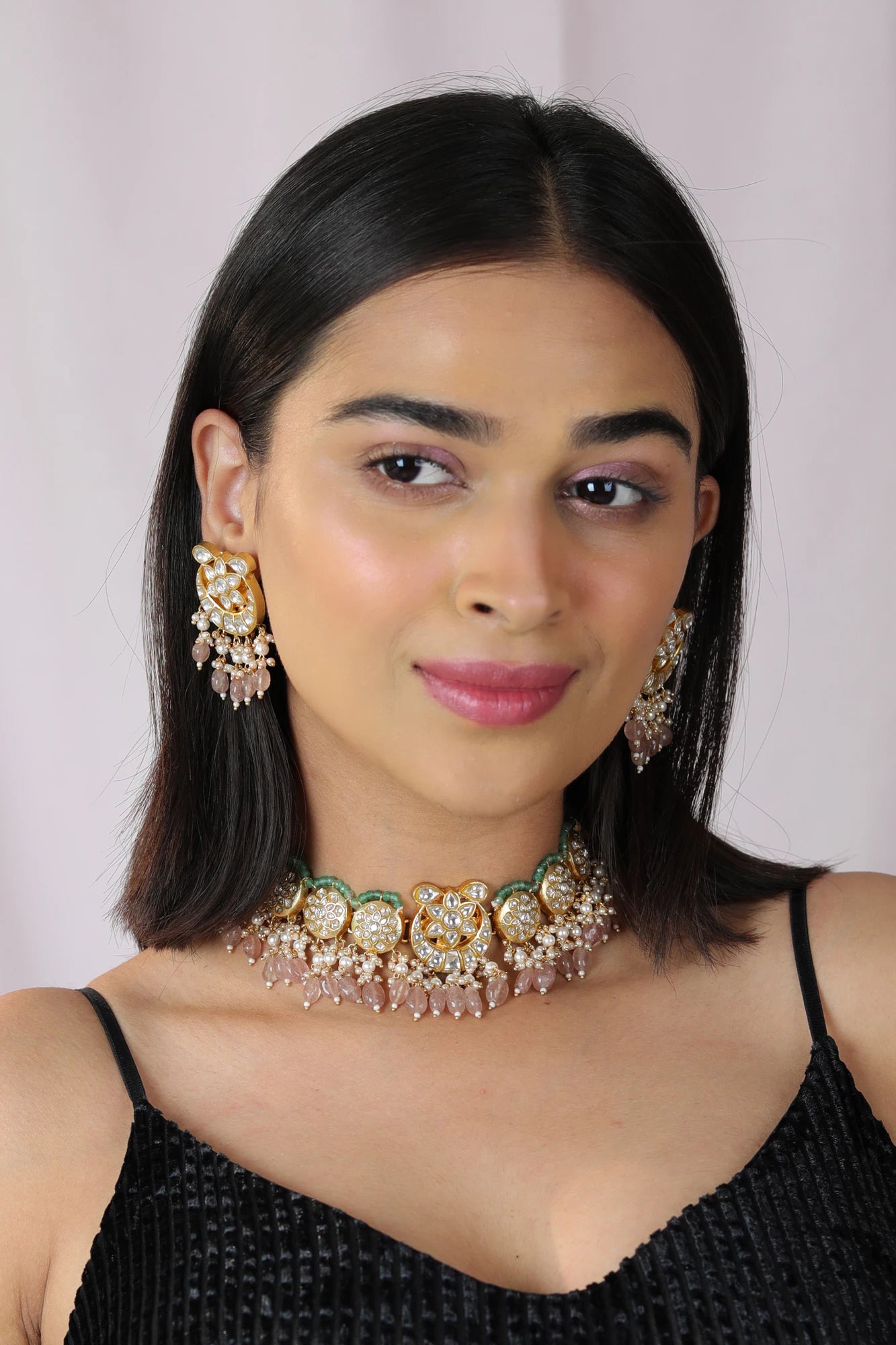 Fushion gold plated jadau necklace set with intricate design in pastel beads