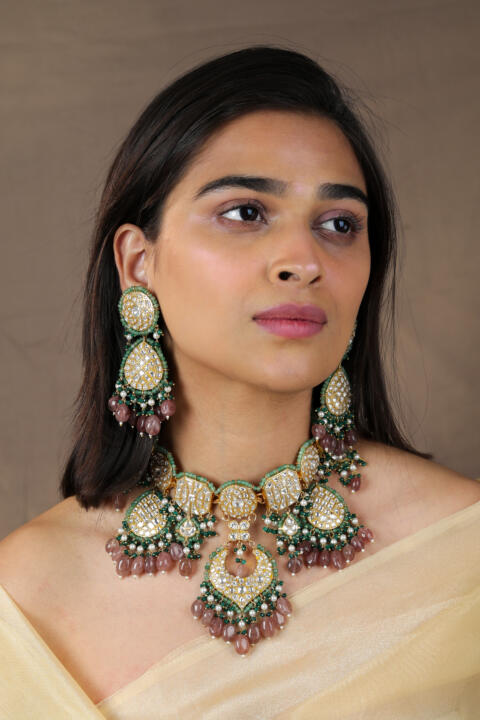 22kt handcrafted natural jadtar stone necklace set with pastel shades and emerald beads