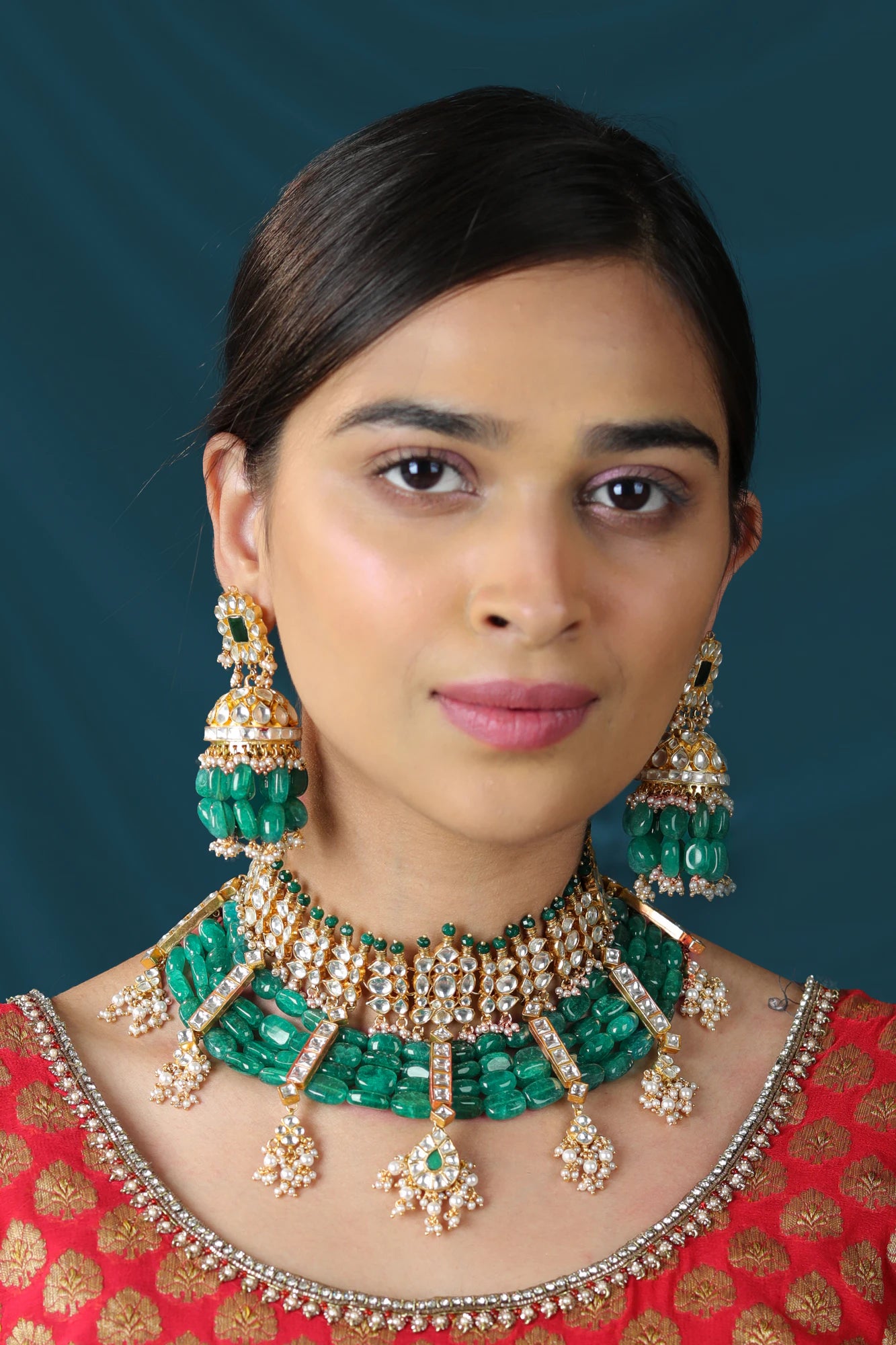 Gold plated Statement Jewellery with semi precious emerald beads