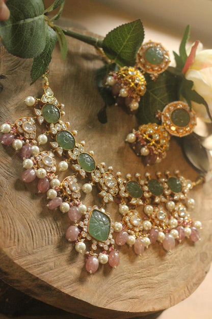 Mehendi green carved stone necklace set with pastel pink beaded necklace and jhumki