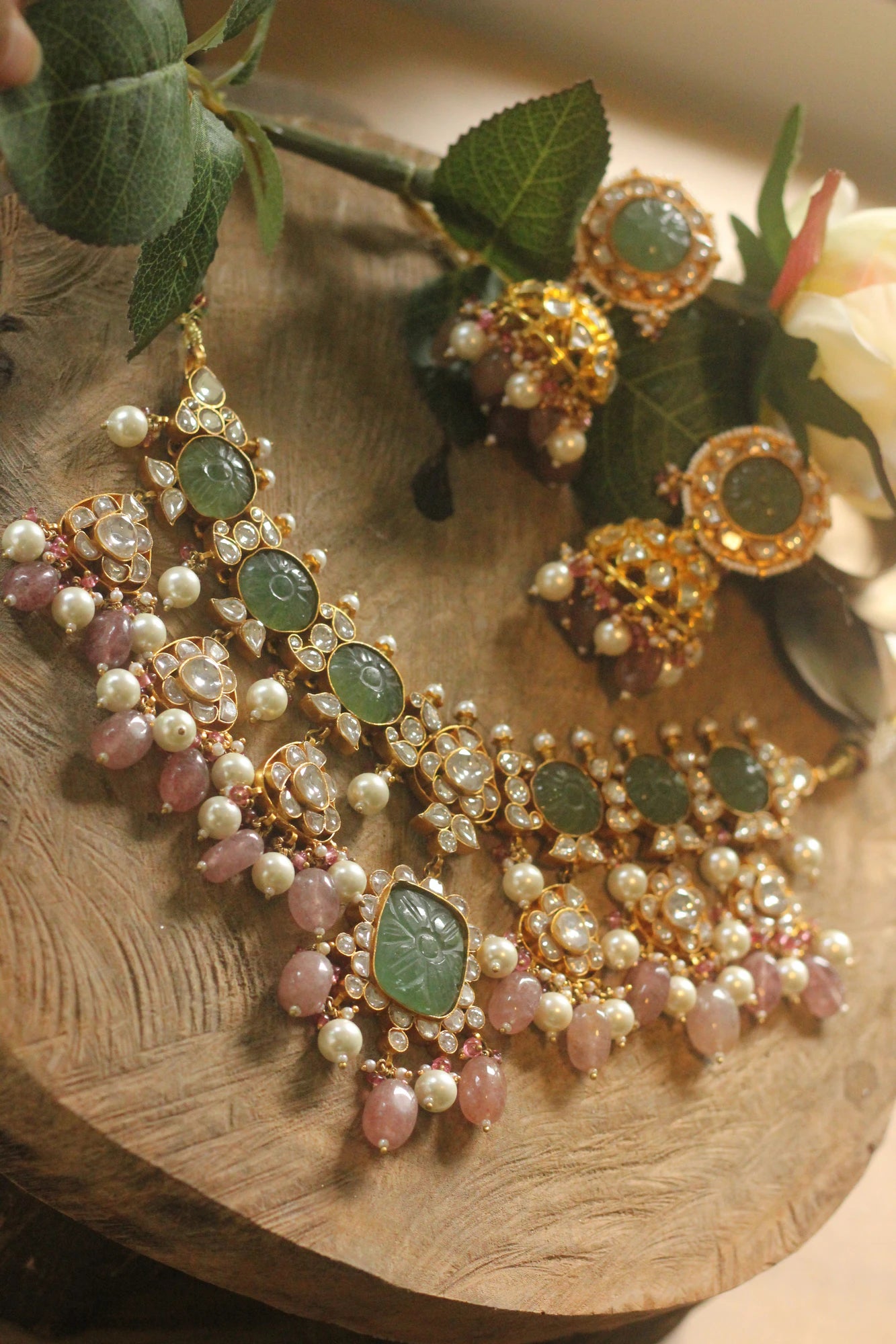 Mehendi green carved stone necklace set with pastel pink beaded necklace and jhumki