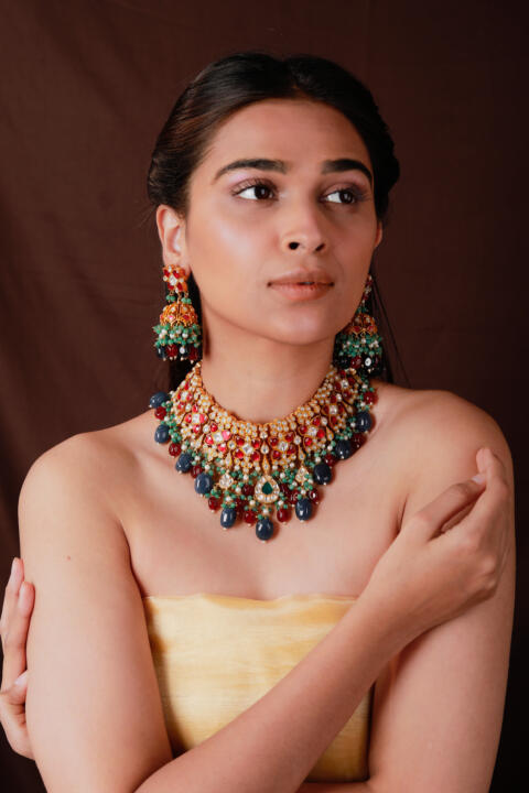 Pink stone necklace set with blue beads and jhumki