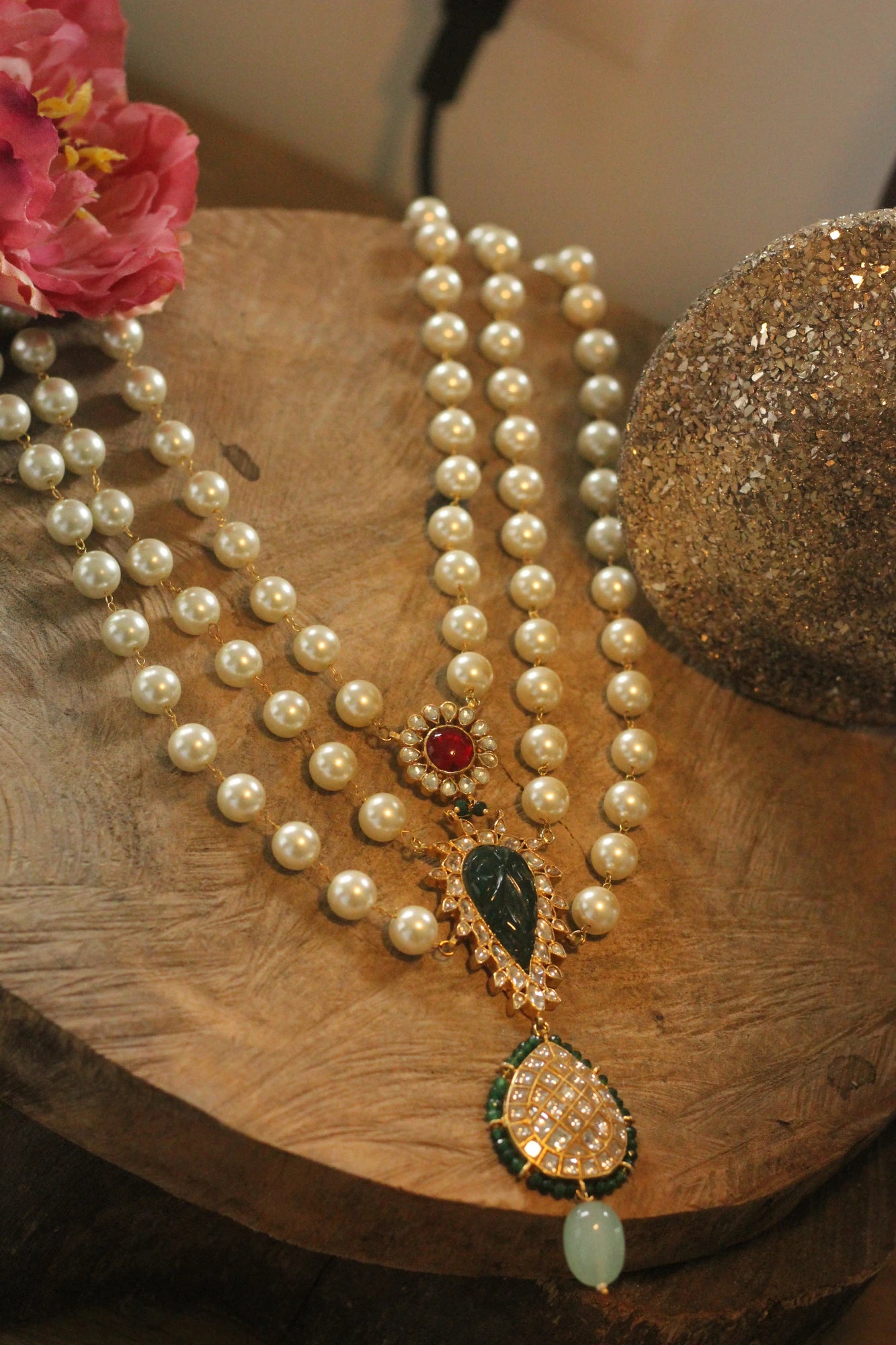 Gold plated white pearl necklace set with pink studs