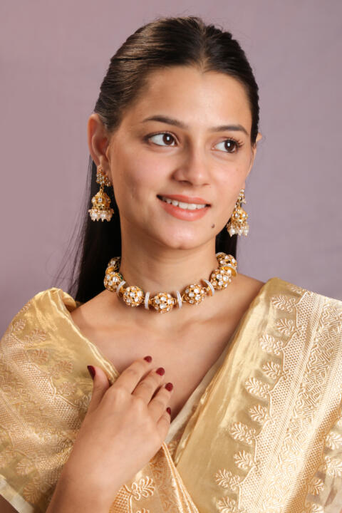 Reversible choker Necklace set in the combination of white mozanite stones and emeralds with cute jhumki earings