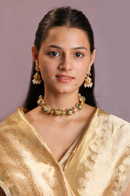 Reversible choker Necklace set in the combination of white mozanite stones and emeralds with cute jhumki earings