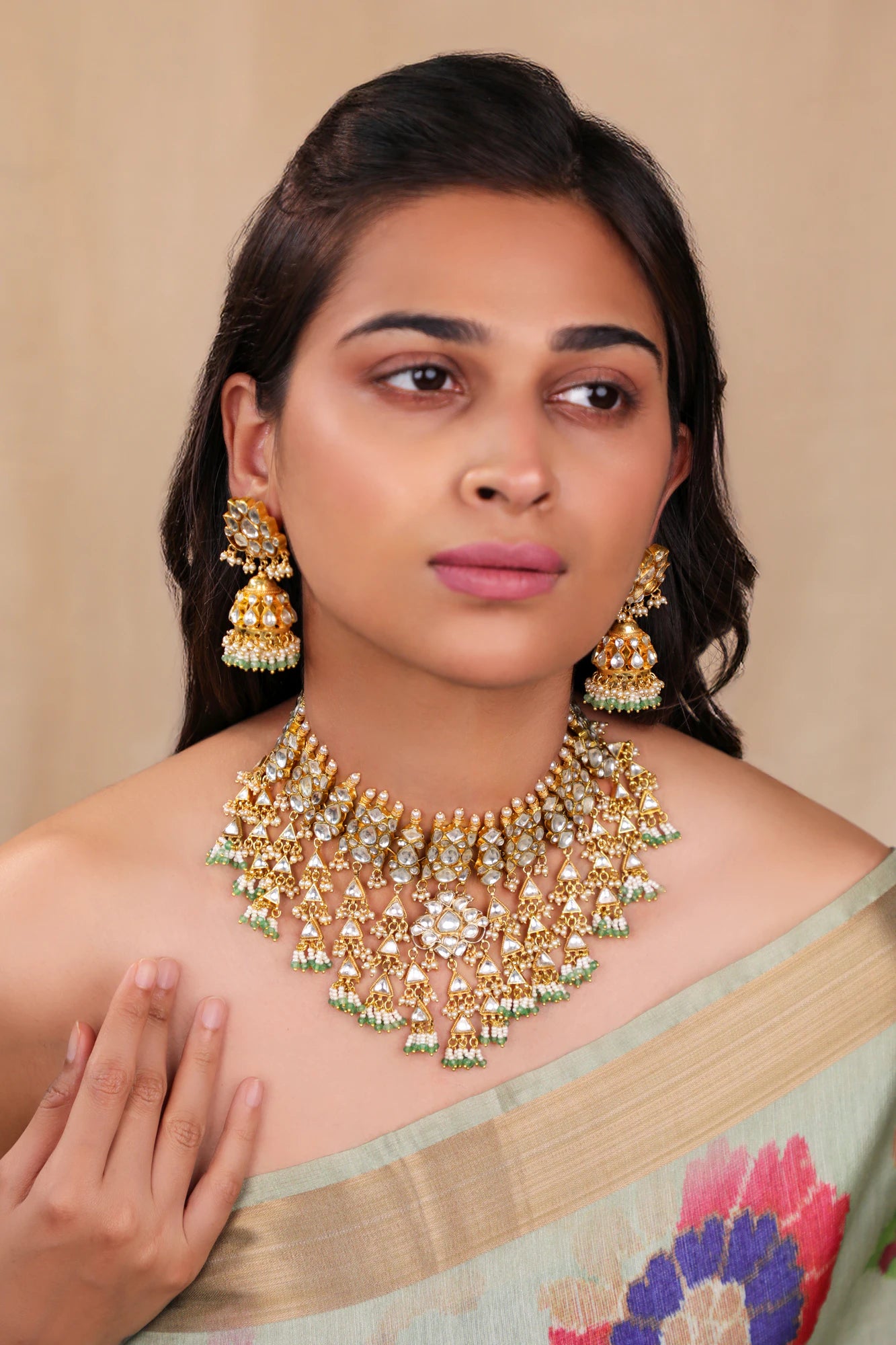 Heavy jadtar kundan set with pearl and jhumkis