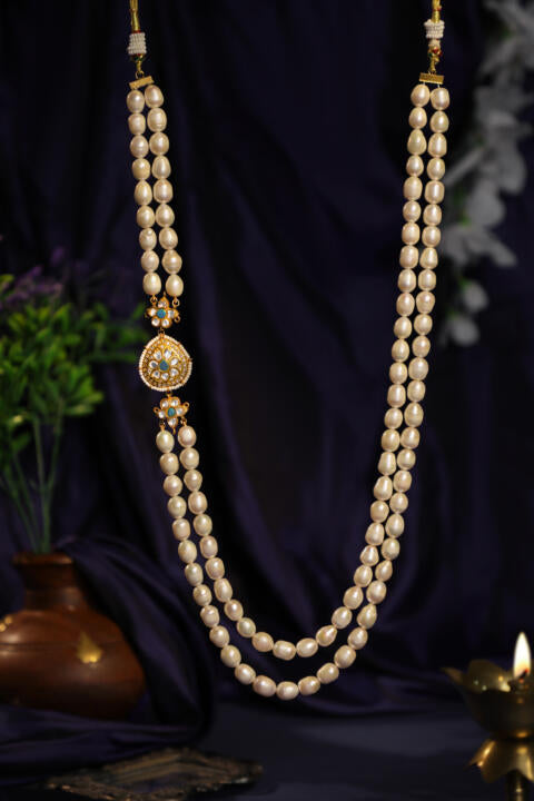 Delicate 2 line maala neclace with side pendant and a little touch of blue