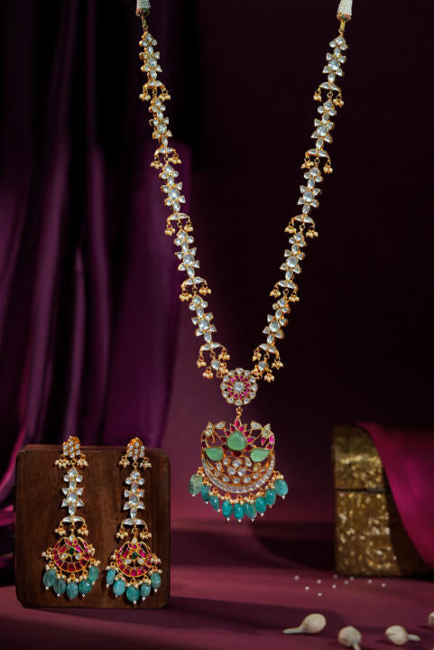 Jadau long pendant necklace with ruby stones and sea green pastel beads