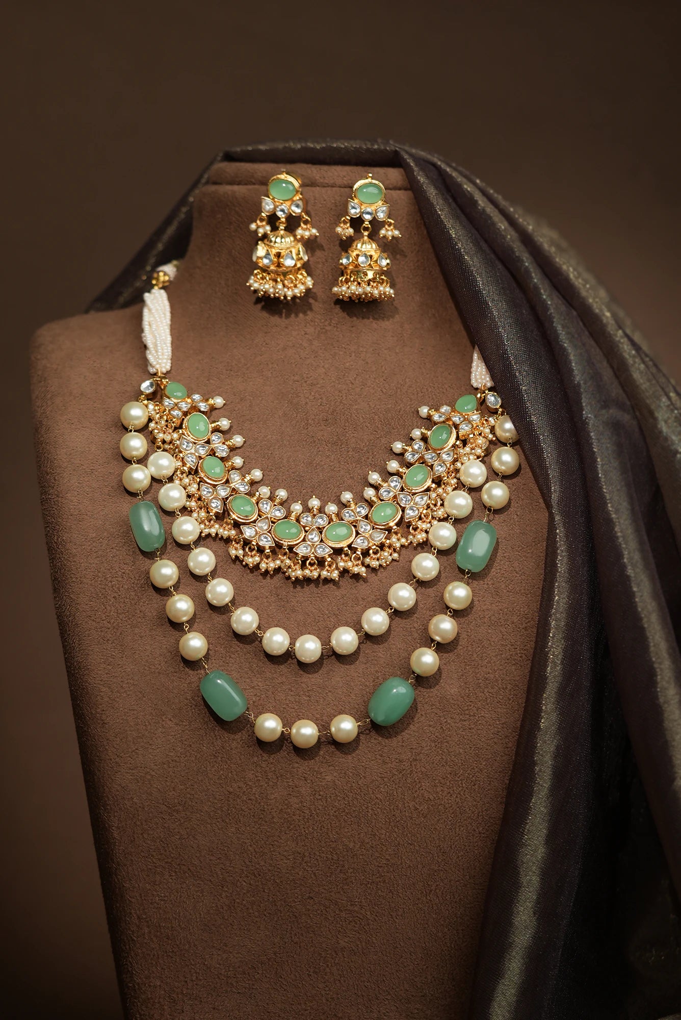 Traditional indian jewellery set with pearl and green beads