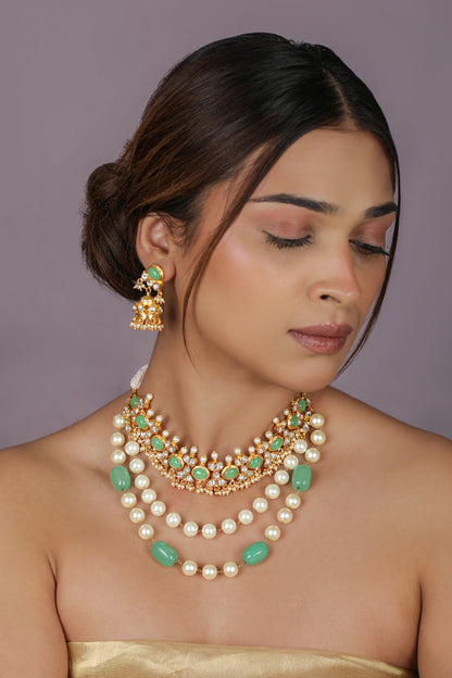 Traditional indian jewellery set with pearl and green beads