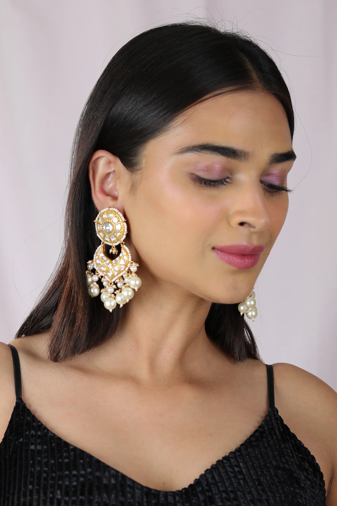White pearl beaded jadtar embellished earrings