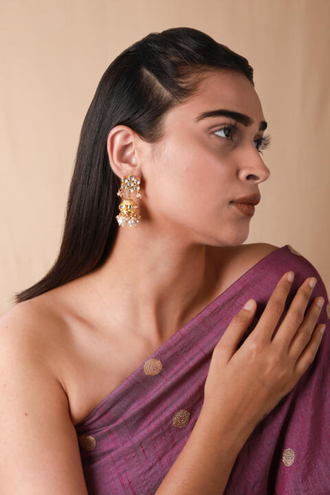 White floral studs with golden jhumki