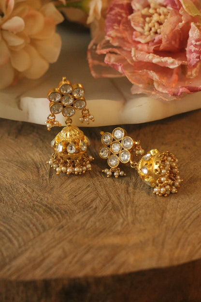 White floral studs with golden jhumki
