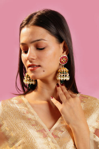 Traditioanl wear pink green jhumki with white pearl