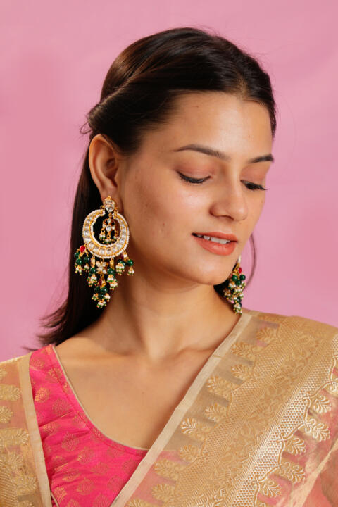 Green beaded white jadtar stone chandbaali with green pink hangings