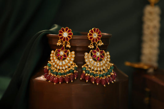 silver chandbali drop earings with ruby beads in floral design