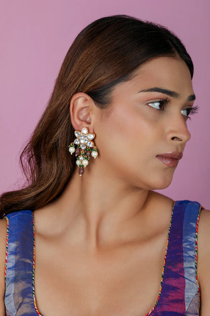 Handcrafted earrings with shell pearls and green beads
