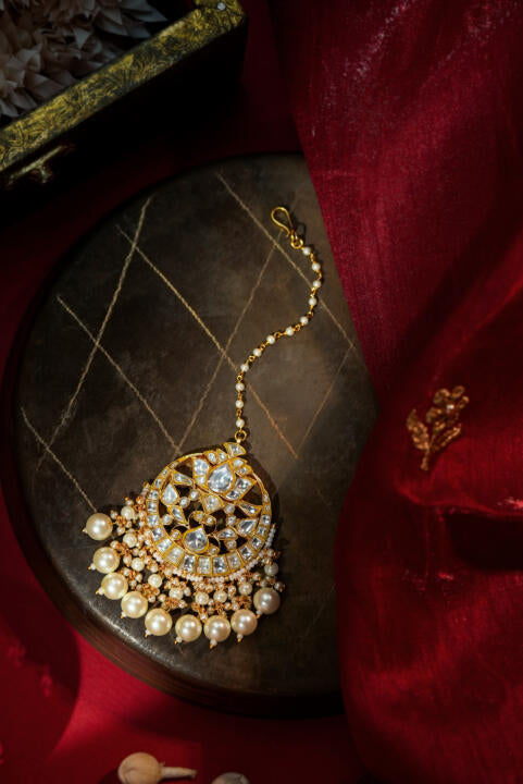 Statement tikka with pearls in traditional design