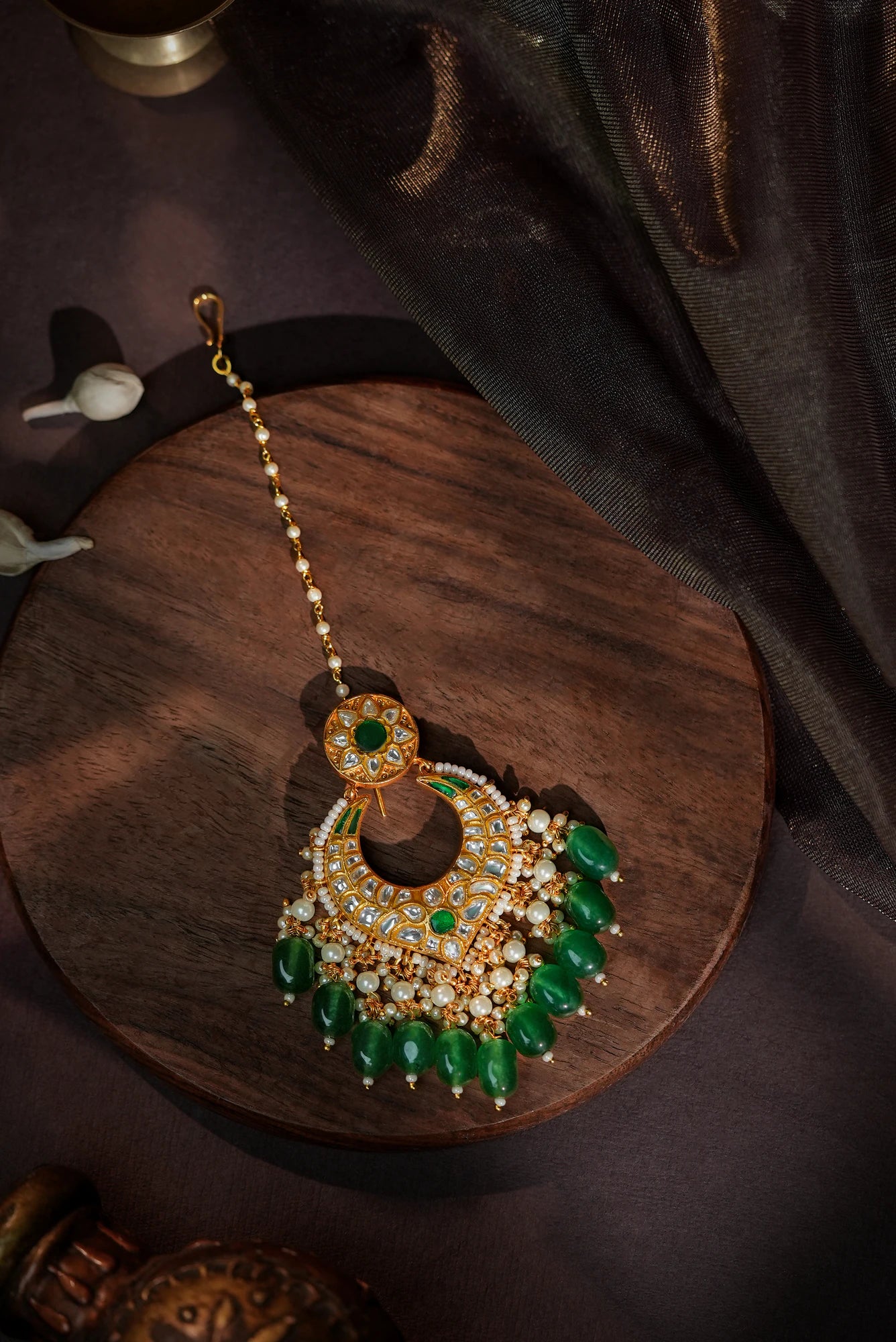 Paan shape tikka with emerald beads