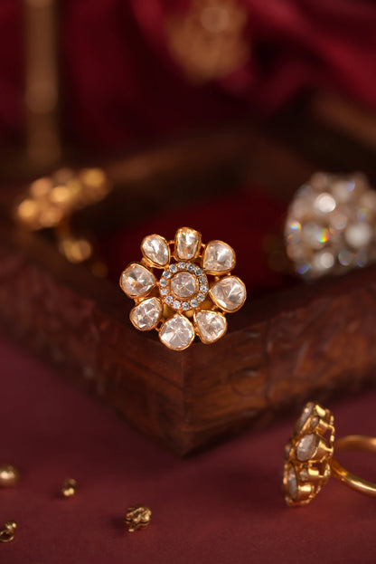 gold plated ring  featuring a floral design with uncut moissanite stones