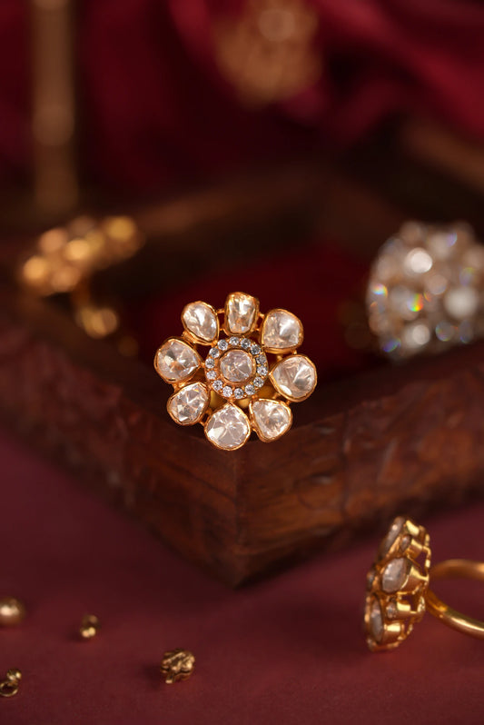 gold plated ring  featuring a floral design with uncut moissanite stones