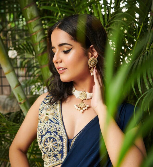 White Jadtar Choker Set With White Pearl And Blue Hangings
