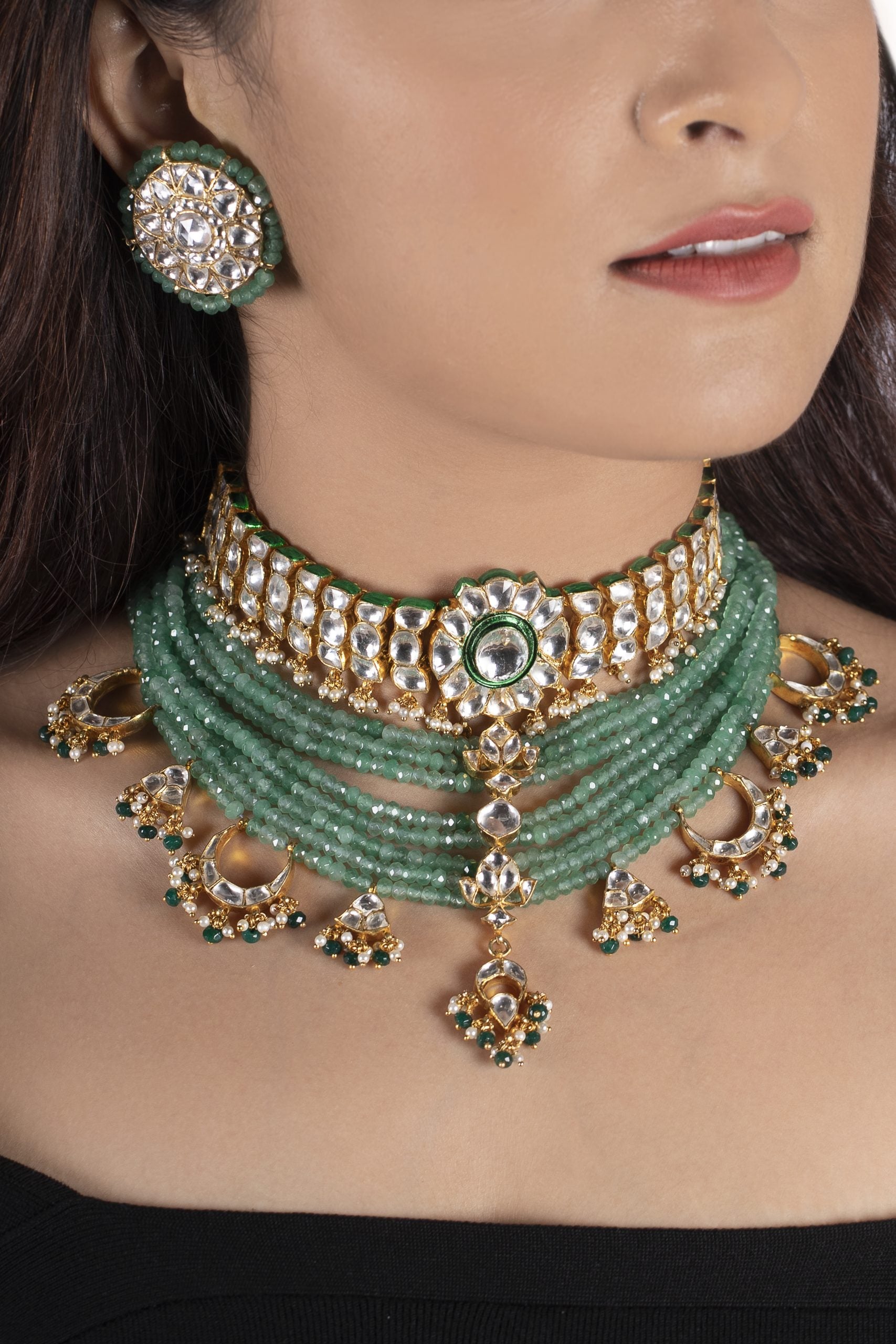 WHITE CHOKER SET ATTACHED  IN 8 LINE SEA GREEN BEADS WITH GREEN HANGING