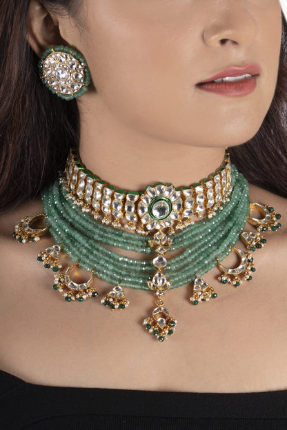 WHITE CHOKER SET ATTACHED  IN 8 LINE SEA GREEN BEADS WITH GREEN HANGING