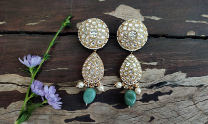 Choker set studded with jadtar stones beadded with pearl and sea green beads