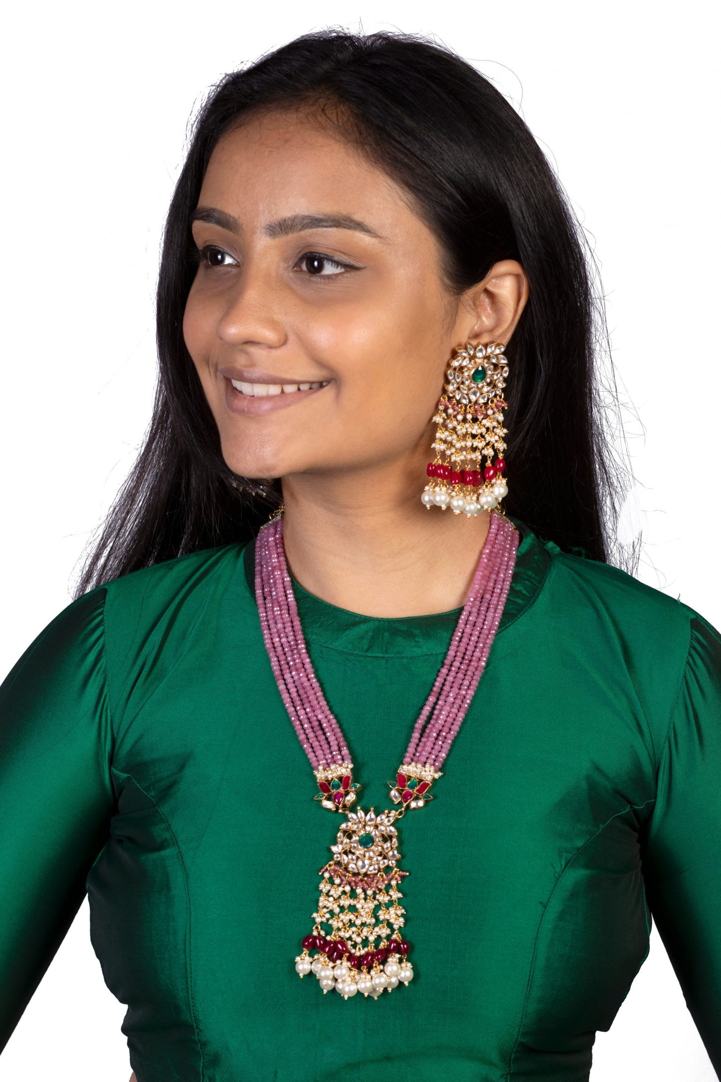 long pink string pendant necklace with green, white and red stones